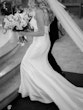 Bride Wearing Simple Fit And Flare Wedding Dress Called Mitchell Marie By Maggie Sottero