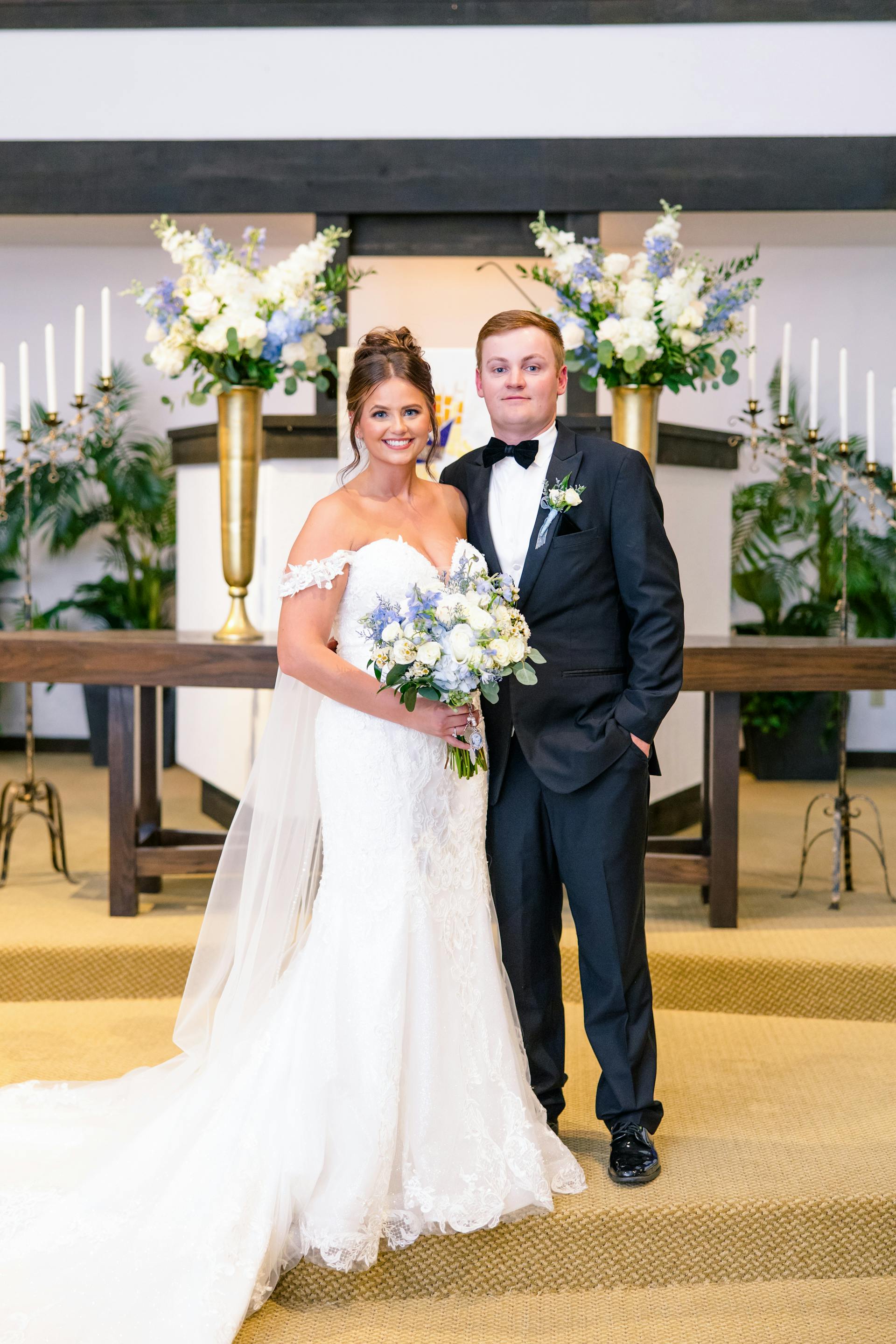 Bride Wearing Lace Fit-n-flare Wedding Dress Called Frederique By Maggie Sottero With Groom