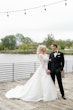 Bride Wearing Lace Princess Wedding Dress Called Norvinia By Sottero And Midgley Holding Hands And Looking At Groom