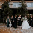 Bride With Bridesmaids. Bride Wearing Simple Ball Gown Wedding Dress With An Elegant Overskirt Called Kyrie By Maggie Sottero