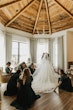 Bride Wearing Sparkly Ballgown Wedding Dress Called Zartasha By Sottero and Midgley Getting Ready With Her Bridesmaids