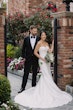 Bride wearing Barcelona by Sottero and Midgley with her husband