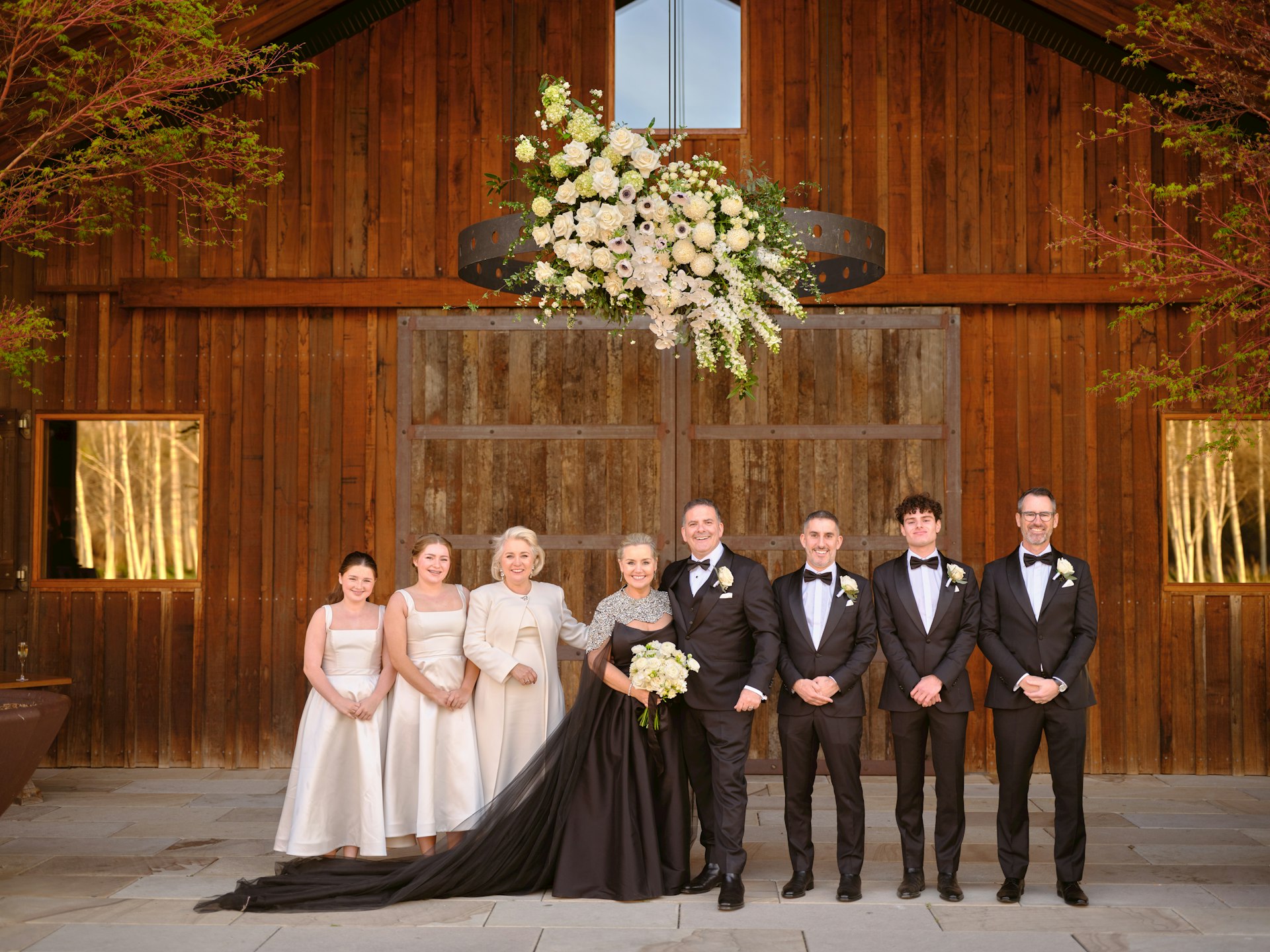 Bride wearing Aspen by Sottero and Midgley with her wedding party