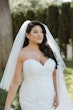 Bride wearing Hattie Lynette wedding dress by Rebecca Ingram