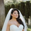 Bride wearing Hattie Lynette wedding dress by Rebecca Ingram