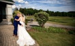 Curvy real bride wearing lace mermaid wedding dress called Judson by Maggie Sottero.