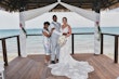 Bride wearing Franklynn by Sottero and Midgley with her husband and his mother