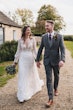 real bride in vintage style lace wedding dress with bishop sleeves called Finley by Sottero & Midgley