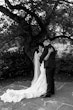 Bride Wearing Lace Backless Wedding Dress Called Chauncey By Sottero And Midgley Holding Groom