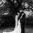 Bride Wearing Lace Backless Wedding Dress Called Chauncey By Sottero And Midgley Holding Groom