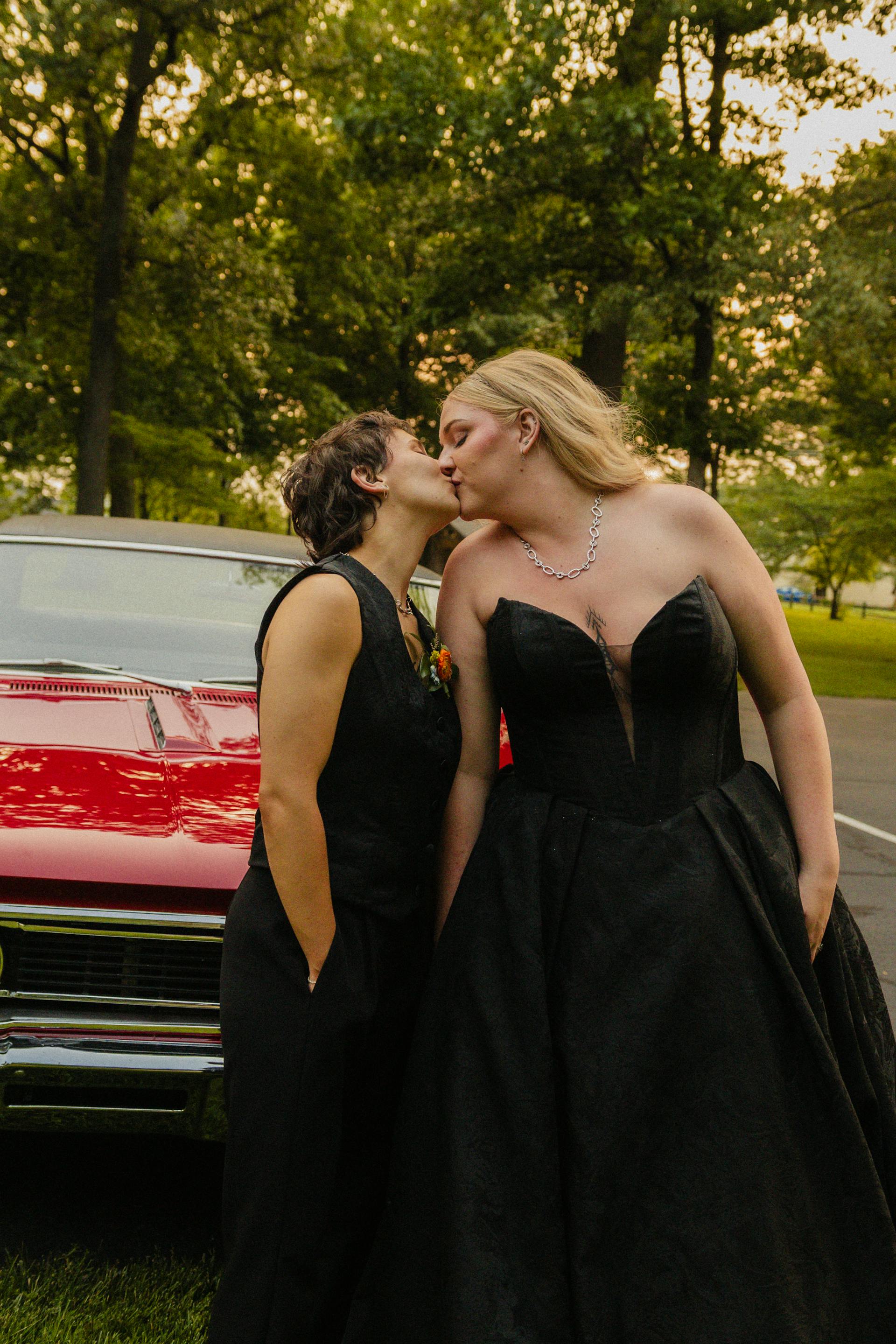 Bride Wearing Black Jacquard Wedding Dress Called Derrick Marie By Maggie Sottero Kissing Bride Wearing Black Suit