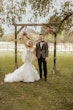 Bride Wearing Pink Lace Mermaid Wedding Dress Called Kenleigh By Sottero And Midgley Cheering With Groom