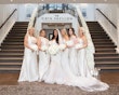 Bride in tulle skirt wedding dress called Alistaire by Maggie Sottero with bridesmaids