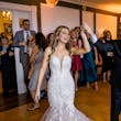Bride wearing Hattie Marie by Rebecca Ingram dancing with her husband