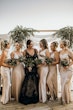 Bride Wearing Black Fit And Flare Wedding Dress Called Zander Lane By Sottero And Midgley With Bridesmaids