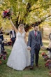 Groom with Bride at Outdoor Wedding Wearing Wedding Dress Called Valona by Sottero and Midgley.