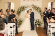 Bride Wearing Sparkly Lace Wedding Dress Called Essex By Sottero And Midgley Kissing Groom At The Ceremony