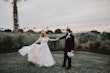 Bride In Lace A-Line Wedding Dress Called Hattie Lane By Rebecca Ingram With Groom