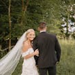 Bride wearing Hattie Lynette by Rebecca Ingram and her husband