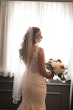 Bride Wearing Embellished Lace Sheath Wedding Dress Called Delilah By Maggie Sottero