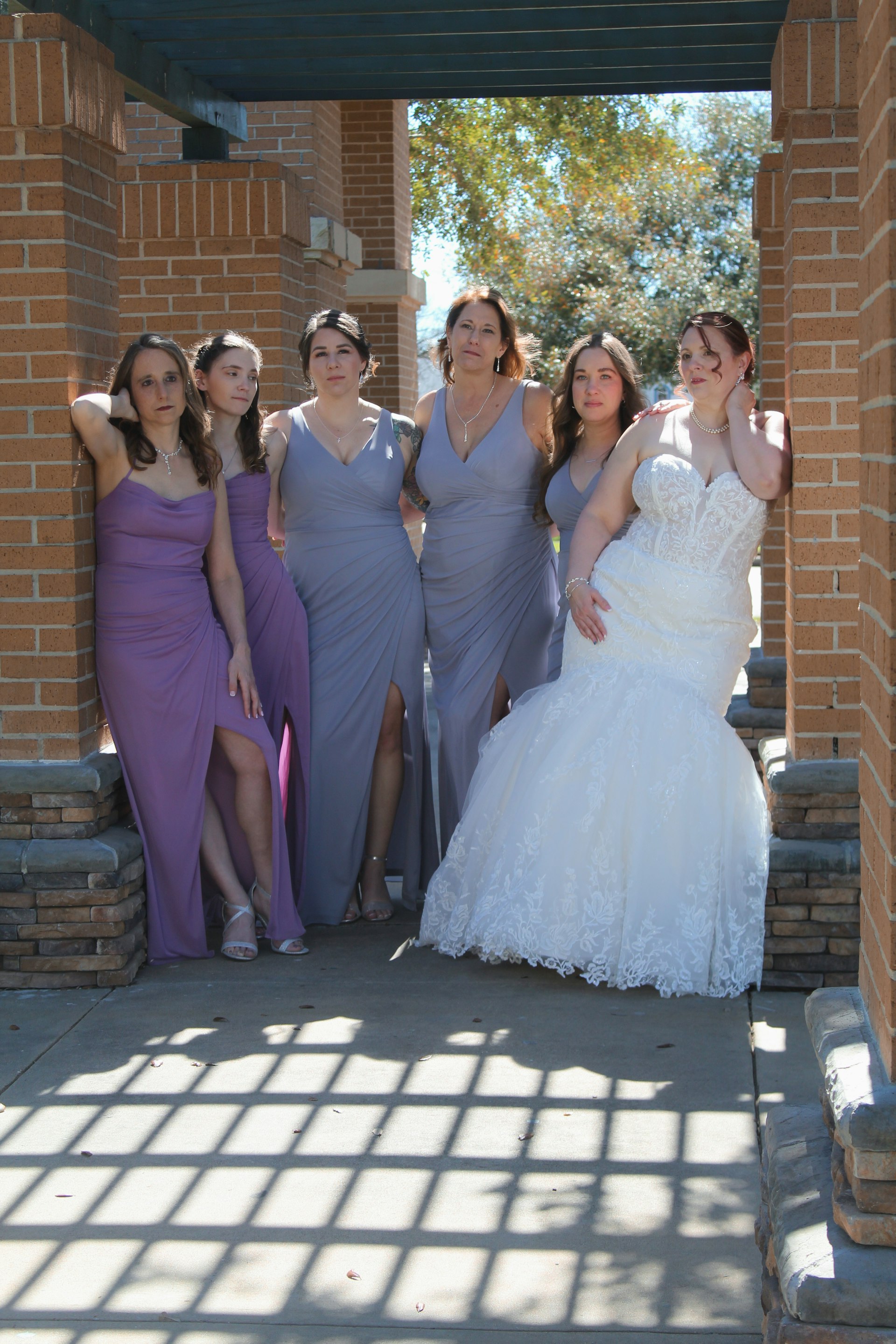 Bride wearing Danielle by Maggie Sottero with her bridesmaids