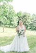 Bride in lace wedding dress called meryl by maggie sottero