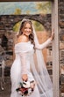 Bride Wearing Sheath Wedding Dress With Pearls Drew Marie By Maggie Sottero