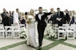 Bride Wearing Pearl Sparkly Bridal Gown Called Drew By Maggie SotteroWalking Down The Aisle With Groom