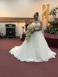 Bride Wearing White Lace Ball Gown 