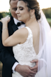 Groom Holding Bride Wearing Nature Lace Wedding Dress Called Albany By Maggie Sottero