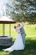 Groom With Bride Wearing Beaded Lace A-Line Wedding Dress With Flutter Sleeves Paige By Maggie Sottero