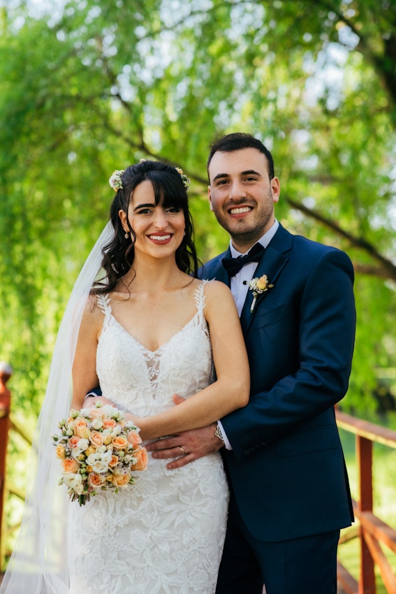 Bride With Groom Wearing Wedding Gown Called Giana Lynette by Maggie Sottero