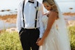 Groom With Bride Wearing A-Line Lace Wedding Dress Marisol By Rebecca Ingram