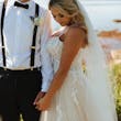 Groom With Bride Wearing A-Line Lace Wedding Dress Marisol By Rebecca Ingram