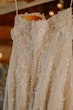 Marguerite wedding dress by Maggie Sottero hanging up