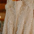 Marguerite wedding dress by Maggie Sottero hanging up