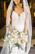 bride in lace crepe sheath wedding dress