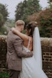 Groom With Bride Wearing Ladonna By Maggie Sottero