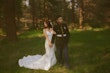 Bride wearing Hilo by Maggie Sottero with her husband