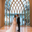 Bride Wearing Simple Long Sleeve Wedding Dress Called Bethany By Rebecca Ingram Kissing Groom