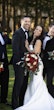 Bride wearing Mitchell Marie by Maggie Sottero with her husband