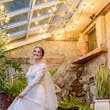 Bride Wearing Boho Sleeved Wedding Dress Called Drita By Maggie Sottero Twirling Her Dress