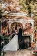 Bride Wearing Lace Ballgown Wedding Dress Called Sasha By Maggie Sottero Kissing The Groom