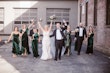 Bride Wearing Classic Elegant Wedding Dress Called Sebastiane By Maggie Sottero Walking With Bridal Party Holding Drinks