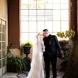 Bride Wearing Beaded Lace Wedding Dress Called Franklynn By Maggie Sottero Kissing Groom