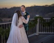 Bride wearing Seneca wedding dress by Sottero and Midgley looking at her husband