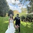 Bride wearing Hattie Marie by Rebecca Ingram walking with her husband