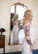 Bride Wearing Beaded Lace Wedding Dress Called Franklynn By Maggie Sottero Looking In A Mirror