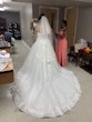 Bride Wearing White Lace Ball Gown 