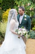 Photo of Bride In Ruffled Wedding Dress Called Timbrey By Maggie Sottero With Groom